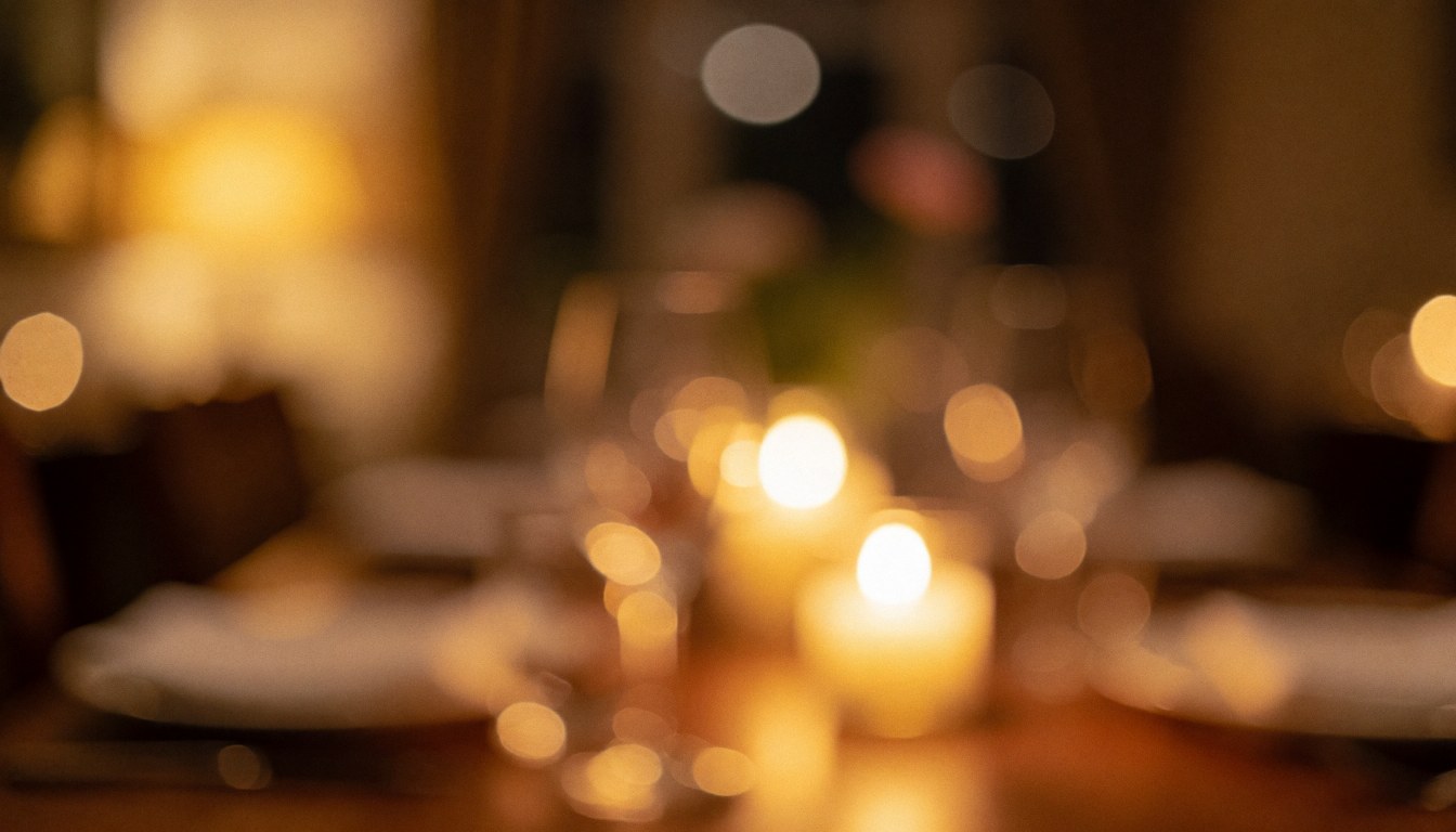Warm restaurant atmosphere featuring tables illuminated by candles and soft lights, suitable for text overlay