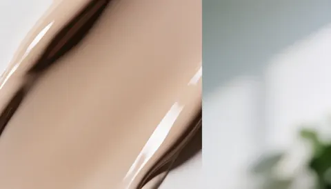 Soft beige abstract gradient background with ample copy space on the right, ideal for nail salon business text overlays