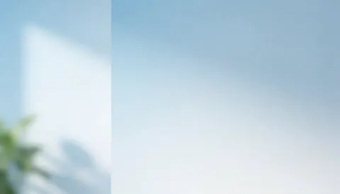 Professional light blue gradient background with blurred green plant silhouettes, ideal for text and corporate design