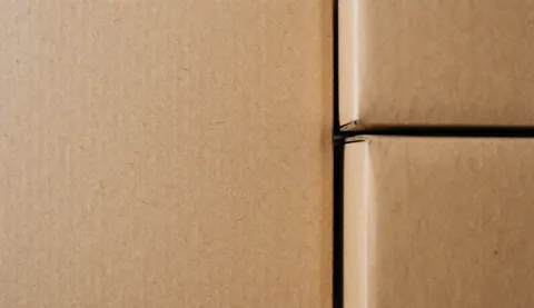 Stacked brown cardboard boxes, ready to pack and ship products to customers.