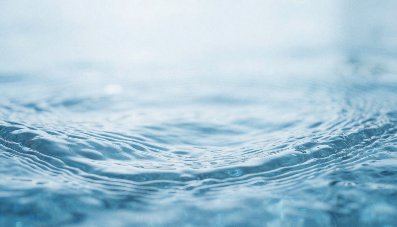 Gentle blue water ripples with bright reflections, ideal for representing cleanliness, freshness, or water services.