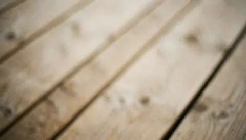 Abstract wooden background with light-colored planks and natural texture for furniture stores or offices.