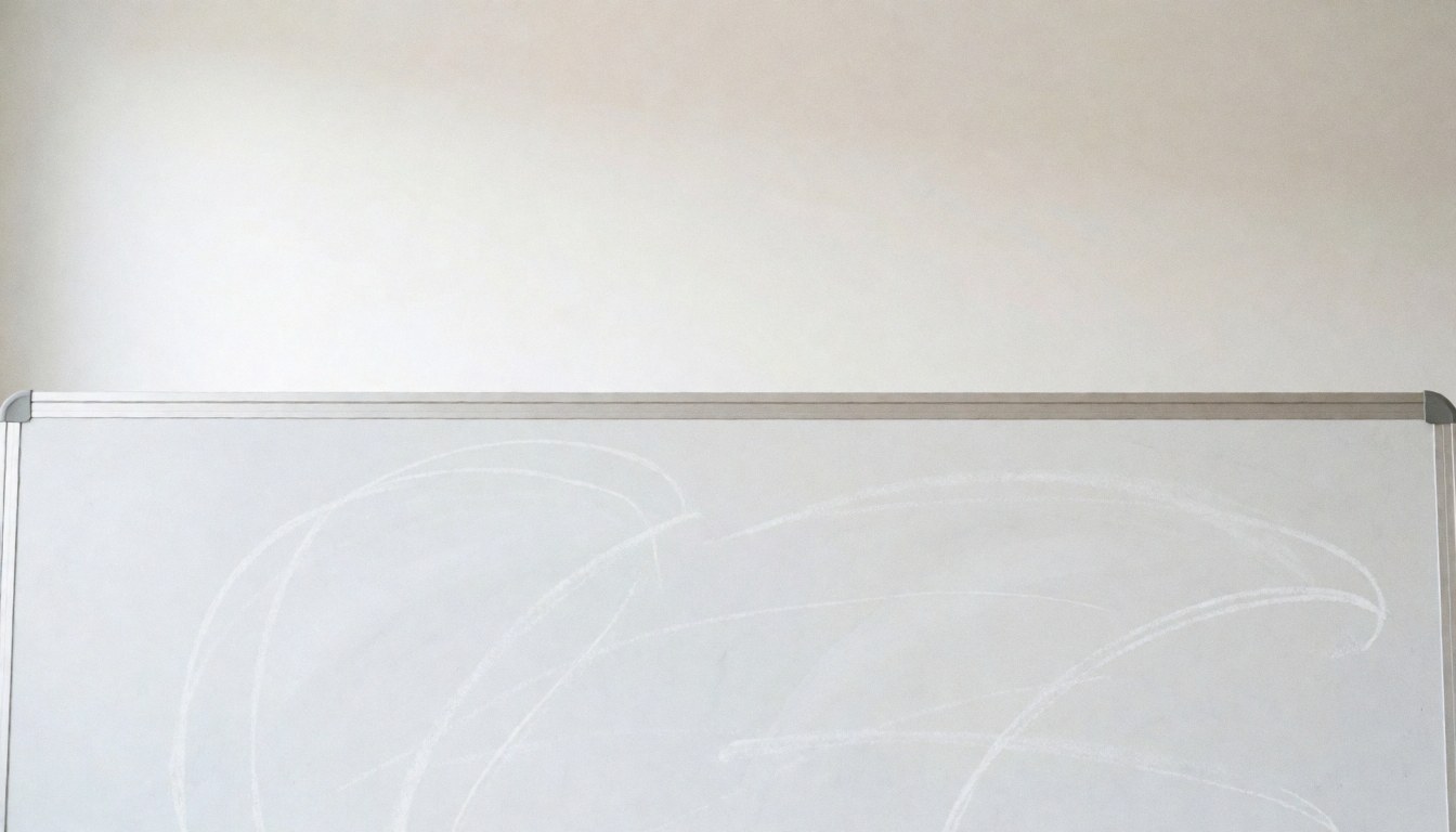 Clean white chalkboard background with faint chalk lines, ideal for educational text overlays in university or classroom settings.