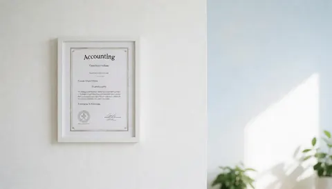 A framed accounting certificate hangs on a white wall with natural light and empty space on the right for text, ideal for accounting businesses.