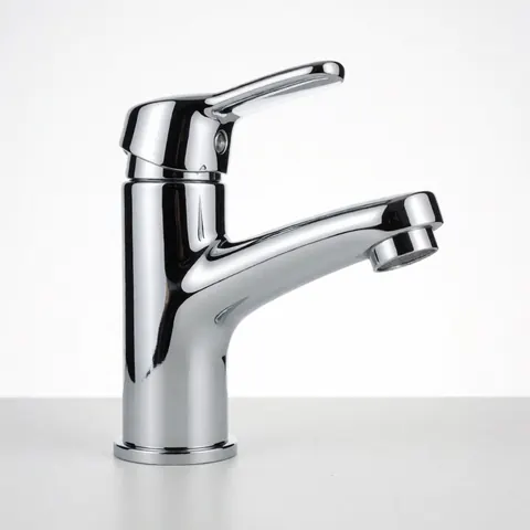 Close-up of a modern chrome faucet mounted on a white bathroom sink, showcasing its sleek design and reflective surface against a clean white background.