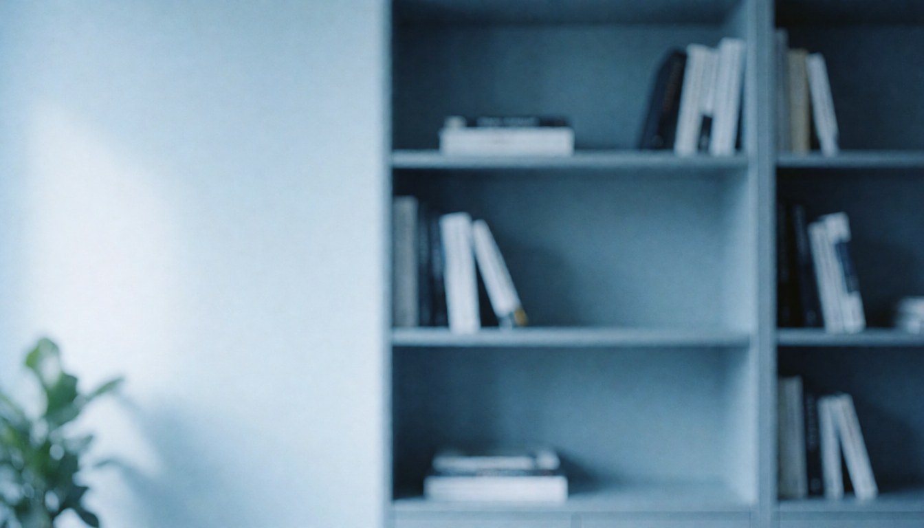 A soft focus image of a blue bookshelf filled with books, serving as a clean and minimalist background for business text.