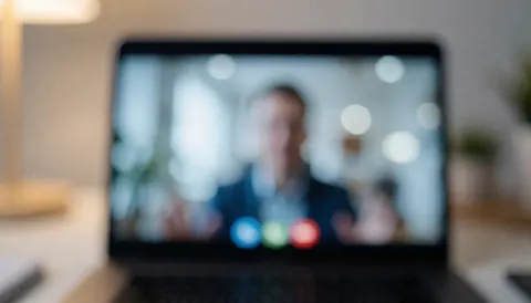 A soft, out-of-focus background featuring bokeh lights and subtle office elements, ideal for text overlay in human resources and remote work contexts.