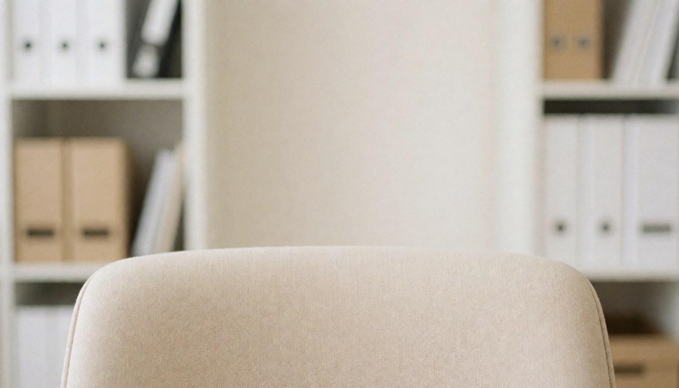 A clean beige office desk with a chair, shelves, and files, providing a professional background for sales and business text
