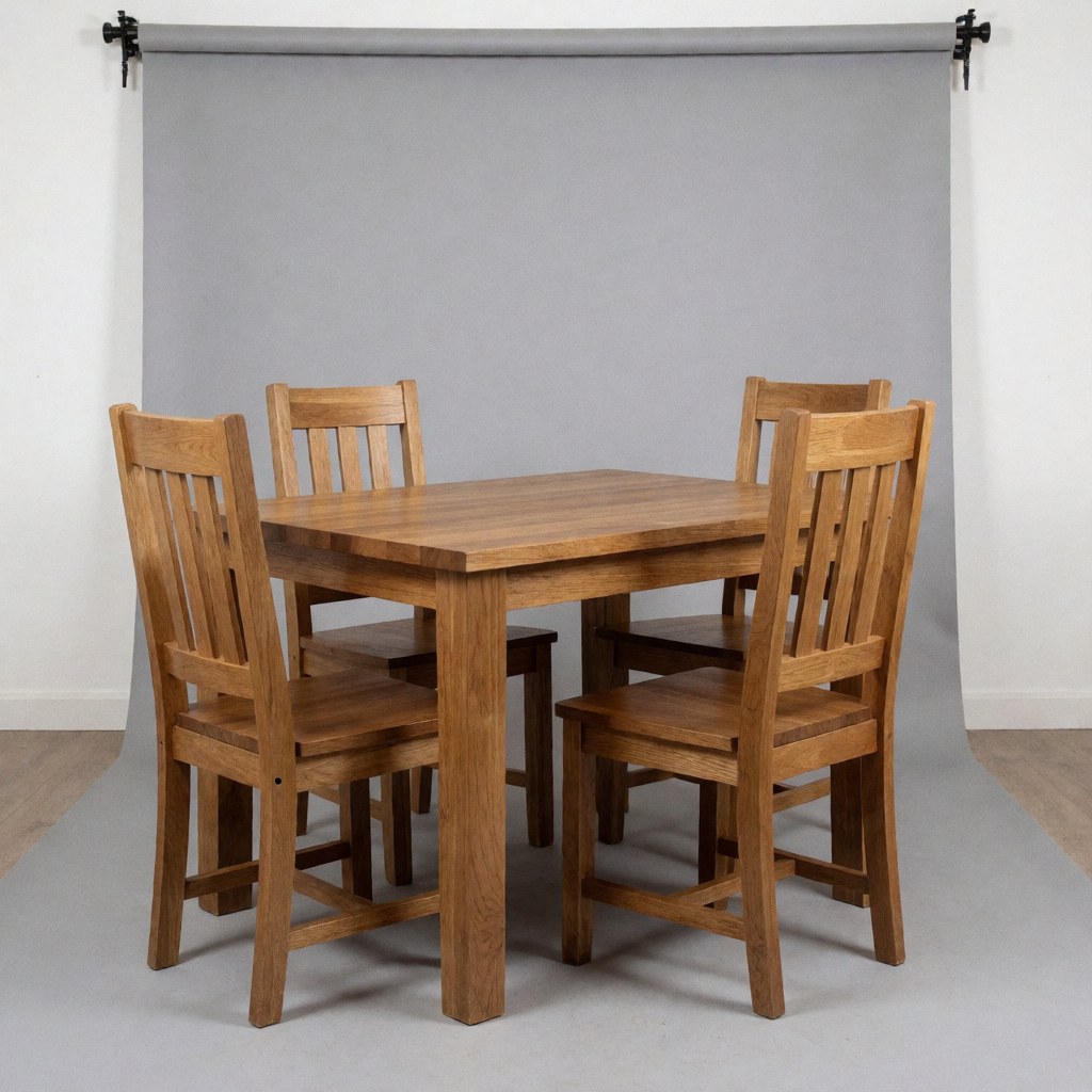 A wooden dining table accompanied by wooden chairs, showcasing quality furniture design against a neutral gray backdrop with professional product lighting.