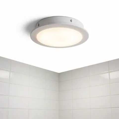 A modern white LED ceiling light fixture shown in isolation against a clean white background, highlighting its sleek design and bright illumination for interior spaces.
