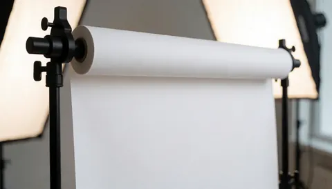Plain white seamless backdrop with soft professional lighting, ideal for marketing agencies and product presentations.