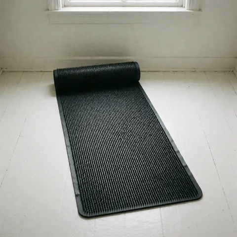 Close-up view of textured reflexology mats designed for acupressure therapy, massage, and wellness recovery in a spa or home setting