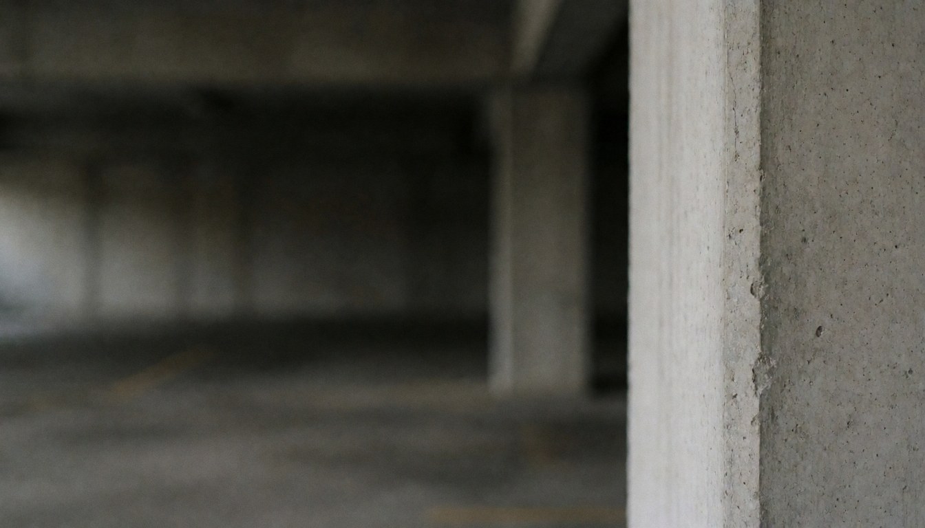 Professional gray concrete garage column background suitable for text overlay, photography services, and graphic design projects.