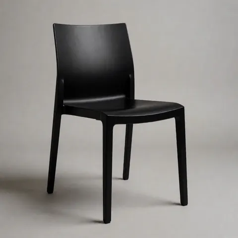 Minimalist matte black outdoor chair with sleek design, perfect for event furniture rental and wedding decor