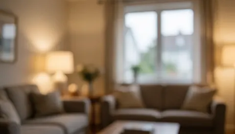 Background of a living room with sofas, lamps, and a window, warm lighting, ideal for commercial text overlays.
