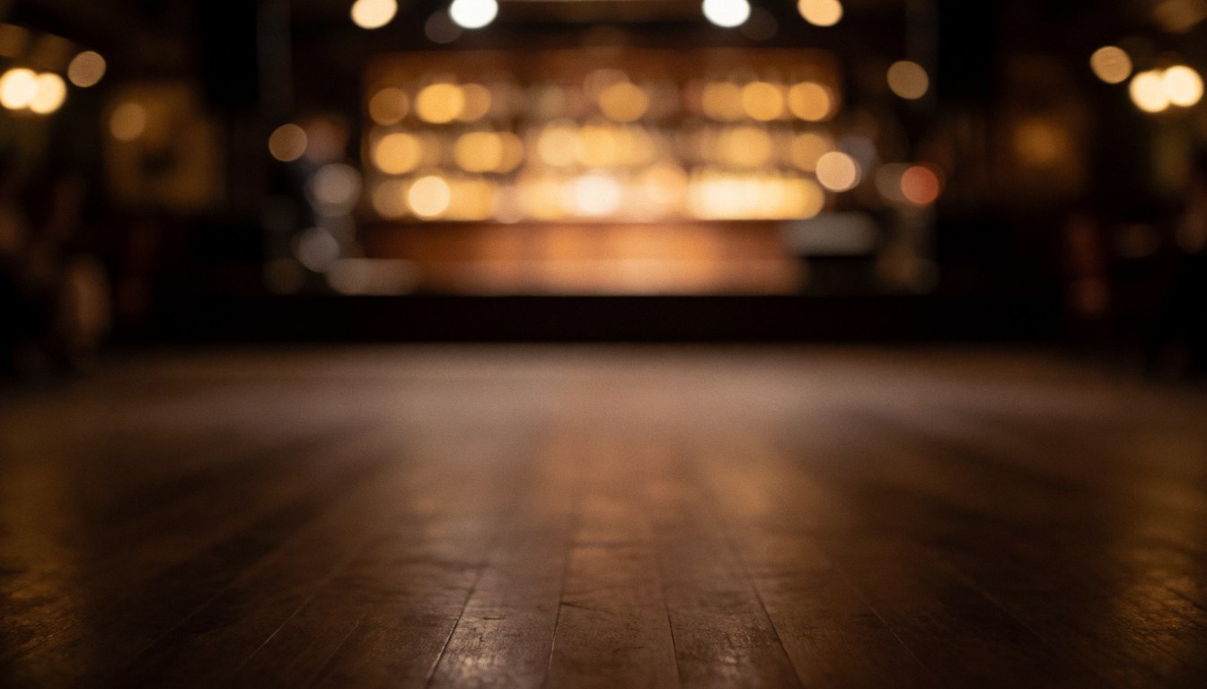 Wooden floor background with warm blurred lights, ideal for dance event promotional text.