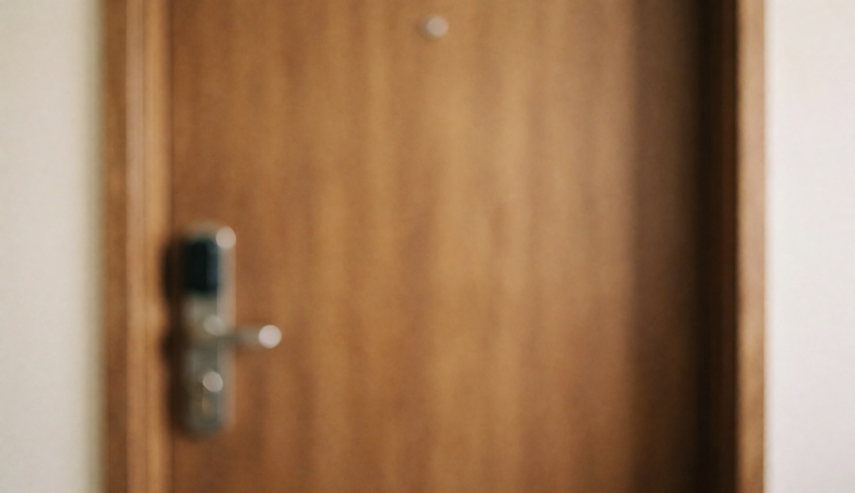 A close-up of a wooden door featuring a modern lock, set against a soft blurred background suitable for service text overlays.