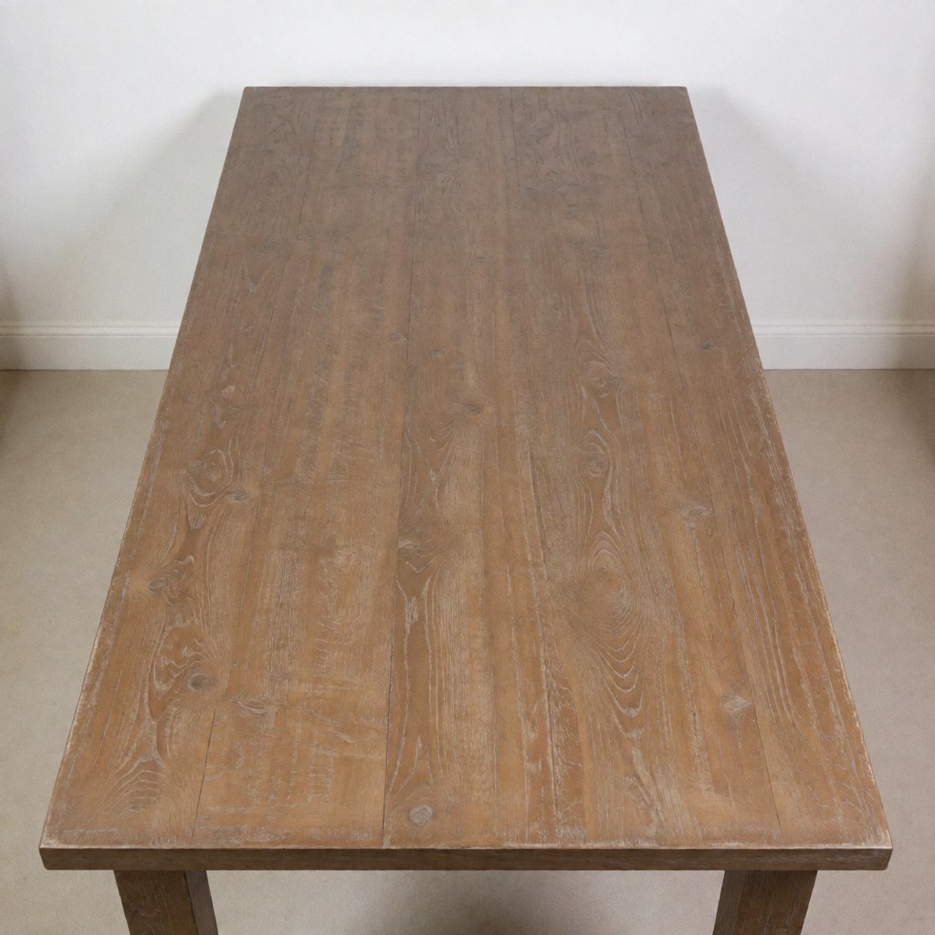 Dining table with matte finish and worn edges on white background, ideal for antique furniture restoration