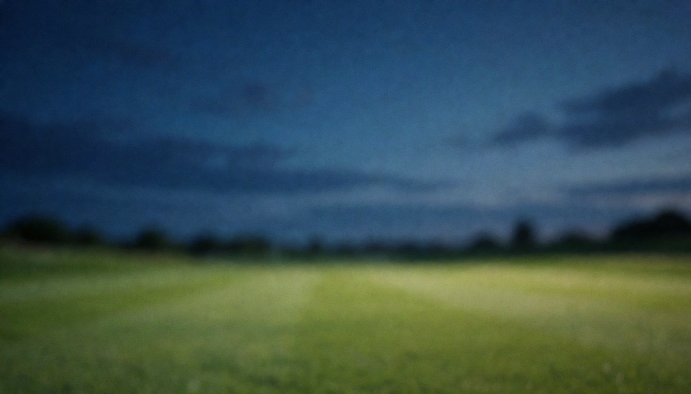 Soft sunset golf course background with dark blue sky and gentle clouds, ideal for golf service text overlays