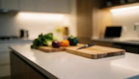 Modern kitchen background with wooden cutting boards and fresh vegetables, suitable for nutrition and coaching service text overlays