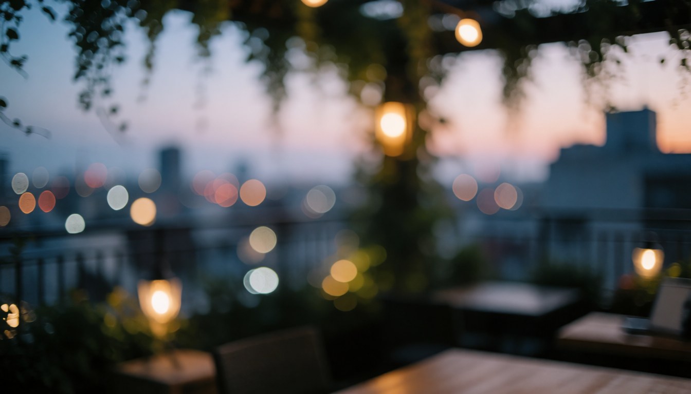 A terrace with tables, warm lights, and hanging vegetation at sunset, ideal for a tango class background.