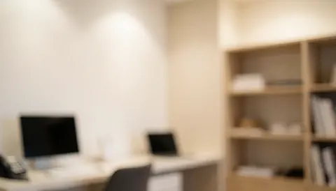 studio background with shelves, work table, and computers, ideal for dance class text overlays