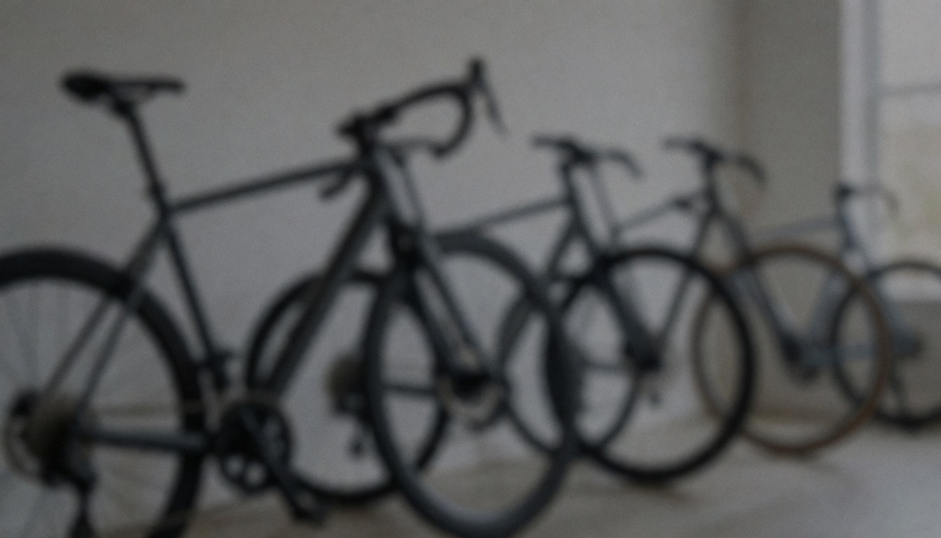 Background of a bicycle repair shop with bikes in a row, soft lighting, and neutral colors suitable for text overlay.
