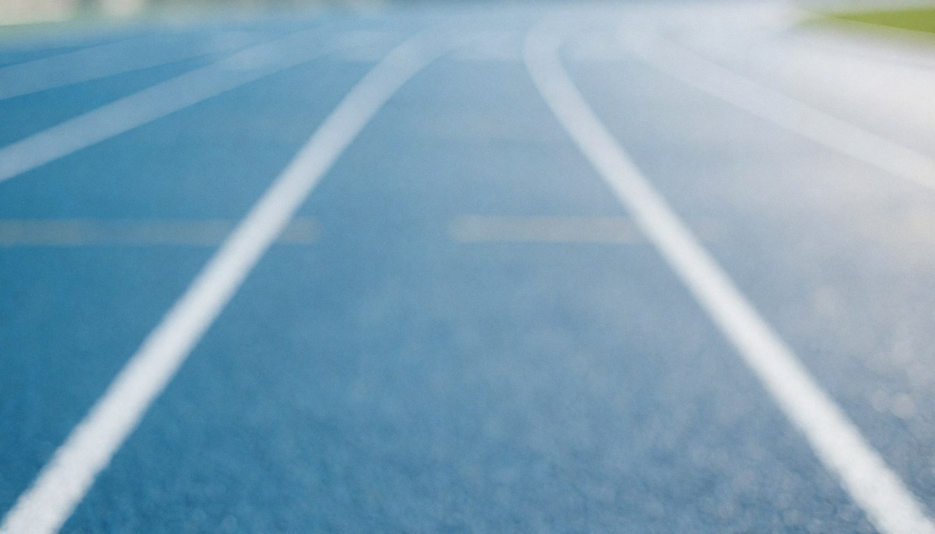 Out-of-focus blue running track with white lane lines, serving as a clean background for text overlays.